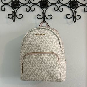 Cute pink and off white Michael Kors backpack